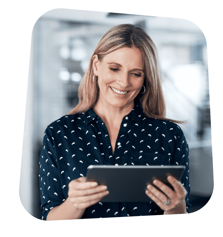 A business woman checks digital marketing results on a tablet.jpg