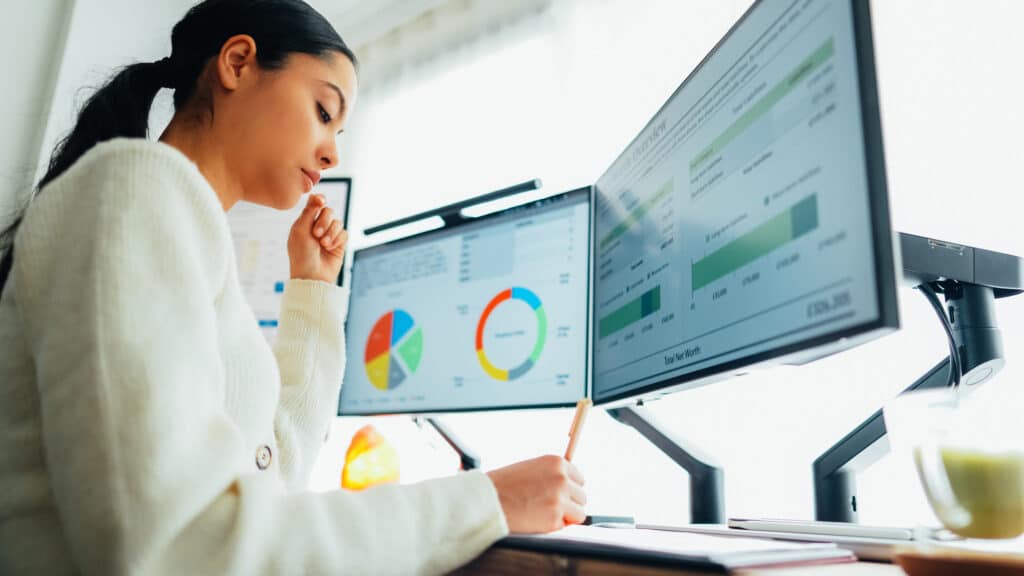 Woman working on an email campaign at home